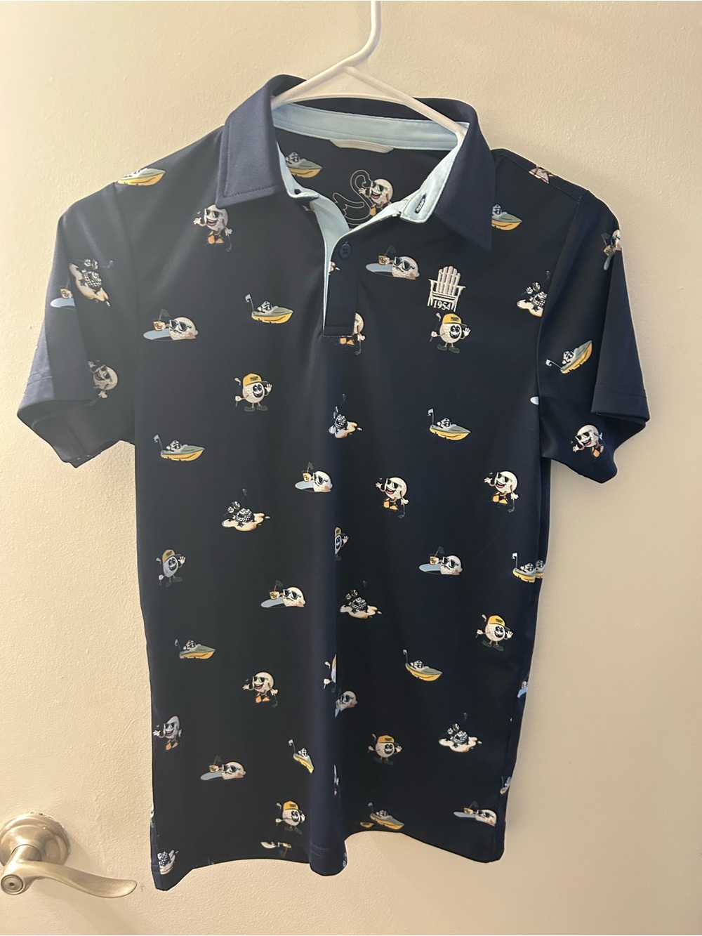 Annie Navy Polo with Playful Cartoon Print